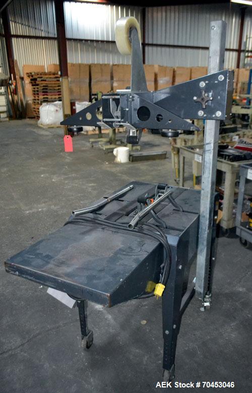Used Little David Model LD3E Top & Bottom Tape Case Sealer. Capable of speeds up to 72' per minute. Can handle a case size range of: (width) 4-1/2" (114mm) to 24" (610mm). Uses pressure sensitive tap...