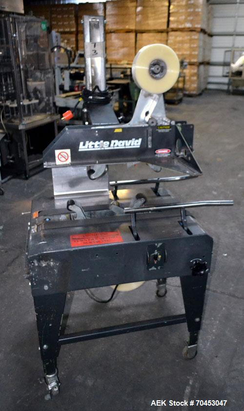 Used Little David Model LD3E Top & Bottom Tape Case Sealer capable of speeds up to 72' per minute. Can handle a case size range of:  Width 4-1/2" (114mm) to 24" (610mm). Uses pressure sensitive tape....