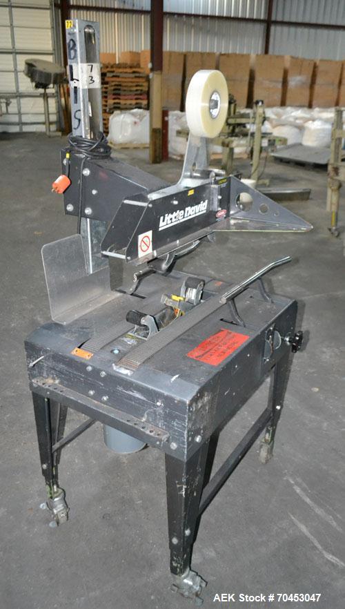 Used Little David Model LD3E Top & Bottom Tape Case Sealer capable of speeds up to 72' per minute. Can handle a case size range of:  Width 4-1/2" (114mm) to 24" (610mm). Uses pressure sensitive tape....