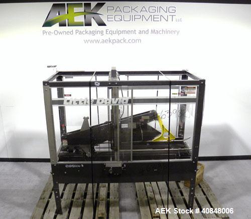 Used Loveshaw Little DavidTop And Bottom Automatic Case Sealer, Model LD16A. Capable of speeds up to 60 feet per minute or 14 cases per minute. Case size range: (length) 8-1/2" to 24" (width) 4-1/2" ...