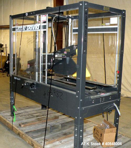 Used Loveshaw Little DavidTop And Bottom Automatic Case Sealer, Model LD16A. Capable of speeds up to 60 feet per minute or 14 cases per minute. Case size range: (length) 8-1/2" to 24" (width) 4-1/2" ...