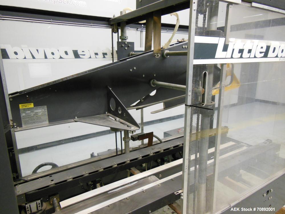 Used Loveshaw Little David Model LD16A Top and Bottom Automatic Case Sealer. Missing (1) tape head. Capable of speeds up to 60 feet per minute or 14 cases per minute. Case size range: (length) 8-1/2"...