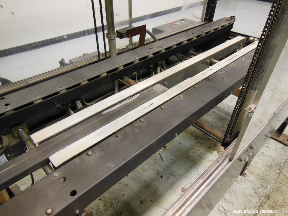 Used Loveshaw Little David Model LD16A Top and Bottom Automatic Case Sealer. Missing (1) tape head. Capable of speeds up to 60 feet per minute or 14 cases per minute. Case size range: (length) 8-1/2"...
