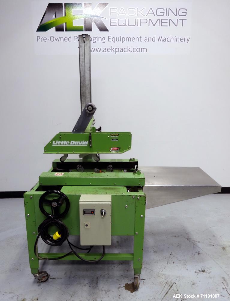 Used Loveshaw Little David Model LD3SB Top & Bottom Tape Case Sealer. Capable of speeds up to 60 feet per minute. Box capacity- Length: 3" to unlimited, Width: 4-1/2" to 20", Height: 4-1/2" to 20". U...