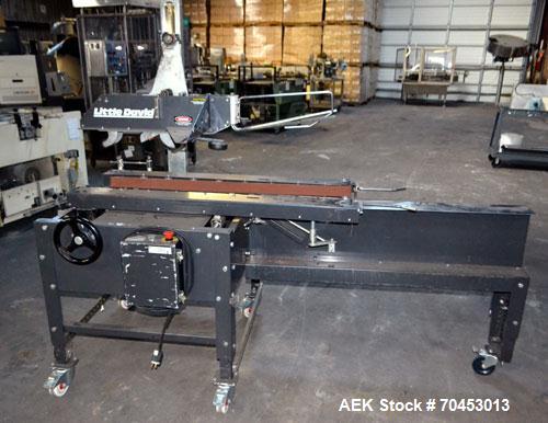 Used Little David SP304 top and bottom case sealer. Operating speed up to 72' per minute. Side belt drives with a case size range: (Length)6" to 24" or 152mm - 610mm (Width) 4-1/2" to 20" or 114mm - ...