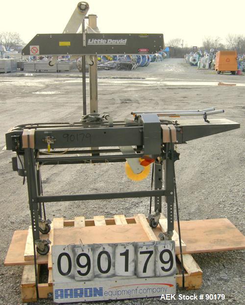 USED: Loveshaw Corp semi-automatic uniform top and bottom case taper, model LD-4C, carbon steel. Case sealer capacity: minimum 2" high x 4-1/2" wide x 4-1/2" long, maximum 26" high x 20" wide x infin...