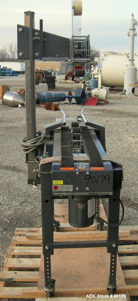 USED: Loveshaw Corp semi-automatic uniform top and bottom case taper, model LD-4C, carbon steel. Case sealer capacity: minimum 2" high x 4-1/2" wide x 4-1/2" long, maximum 26" high x 20" wide x infin...