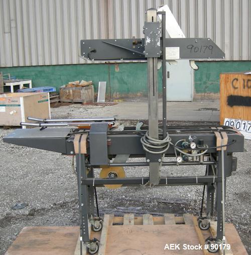 USED: Loveshaw Corp semi-automatic uniform top and bottom case taper, model LD-4C, carbon steel. Case sealer capacity: minimum 2" high x 4-1/2" wide x 4-1/2" long, maximum 26" high x 20" wide x infin...