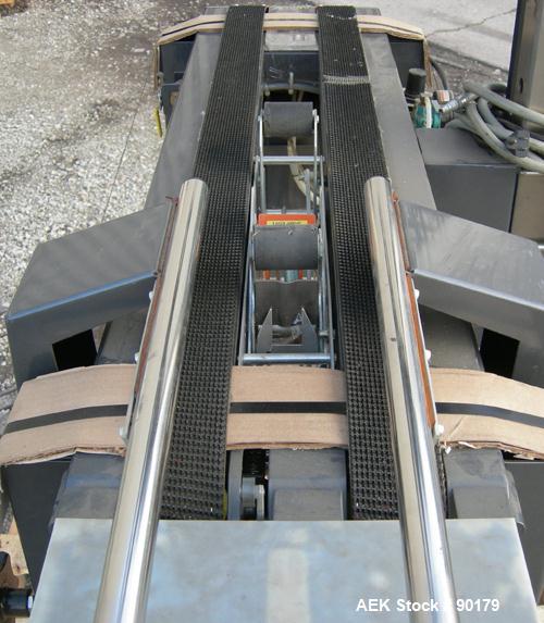 USED: Loveshaw Corp semi-automatic uniform top and bottom case taper, model LD-4C, carbon steel. Case sealer capacity: minimum 2" high x 4-1/2" wide x 4-1/2" long, maximum 26" high x 20" wide x infin...