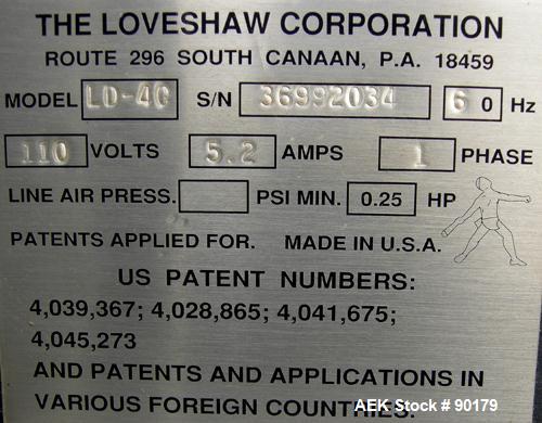 USED: Loveshaw Corp semi-automatic uniform top and bottom case taper, model LD-4C, carbon steel. Case sealer capacity: minimum 2" high x 4-1/2" wide x 4-1/2" long, maximum 26" high x 20" wide x infin...