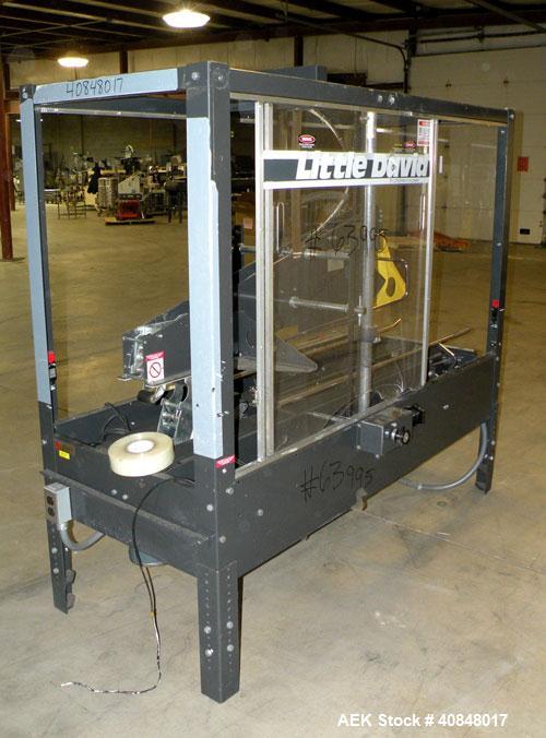 Used Loveshaw Little David Model LD16A Top and Bottom Automatic Case Sealer. Caspable of speeds up to 60 feet per minute or 14 cases per minute. Case size range: (length) 8-1/2" to 24" (width) 4-1/2"...