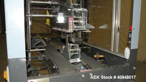 Used Loveshaw Little David Model LD16A Top and Bottom Automatic Case Sealer. Caspable of speeds up to 60 feet per minute or 14 cases per minute. Case size range: (length) 8-1/2" to 24" (width) 4-1/2"...