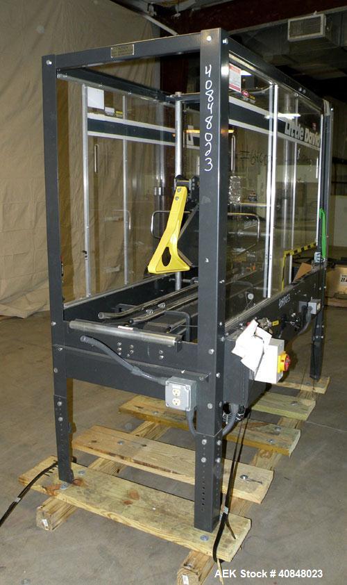 Used Loveshaw Little David Top and Bottom Automatic Case Sealer, Model LD16A, carbon steel. Case Sealer Capacity: minimum 4 1/2" high x 6" wide x 8" long; maximum 20" high x 20" wide x 24" long (opti...