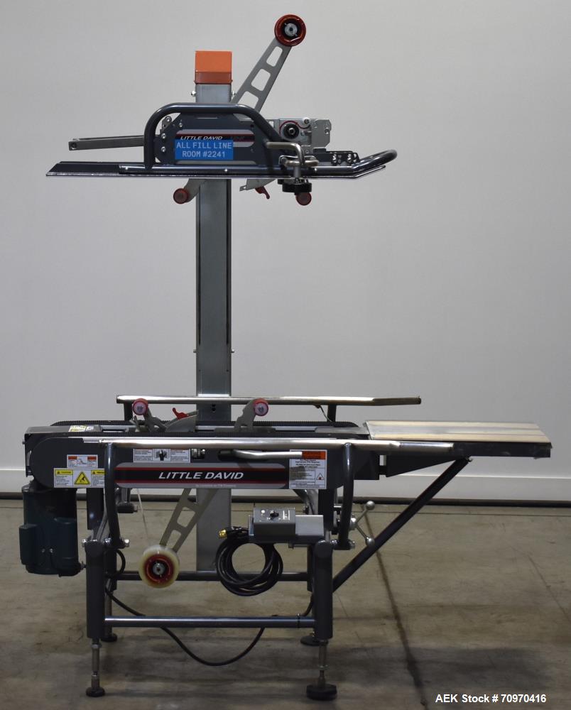 Used Loveshaw / Little David Model LDX/CRS Case Taper. Box Capacity: 4.5" to unlimited length x 5.5" to 27" width x 4.5" to 24" height. Operating belt speeds: 80 ft/min. Maximum roll diameter 15". Se...