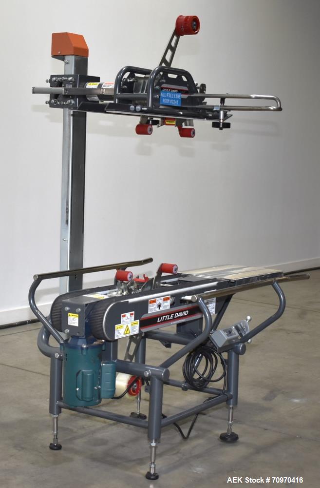 Used Loveshaw / Little David Model LDX/CRS Case Taper. Box Capacity: 4.5" to unlimited length x 5.5" to 27" width x 4.5" to 24" height. Operating belt speeds: 80 ft/min. Maximum roll diameter 15". Se...