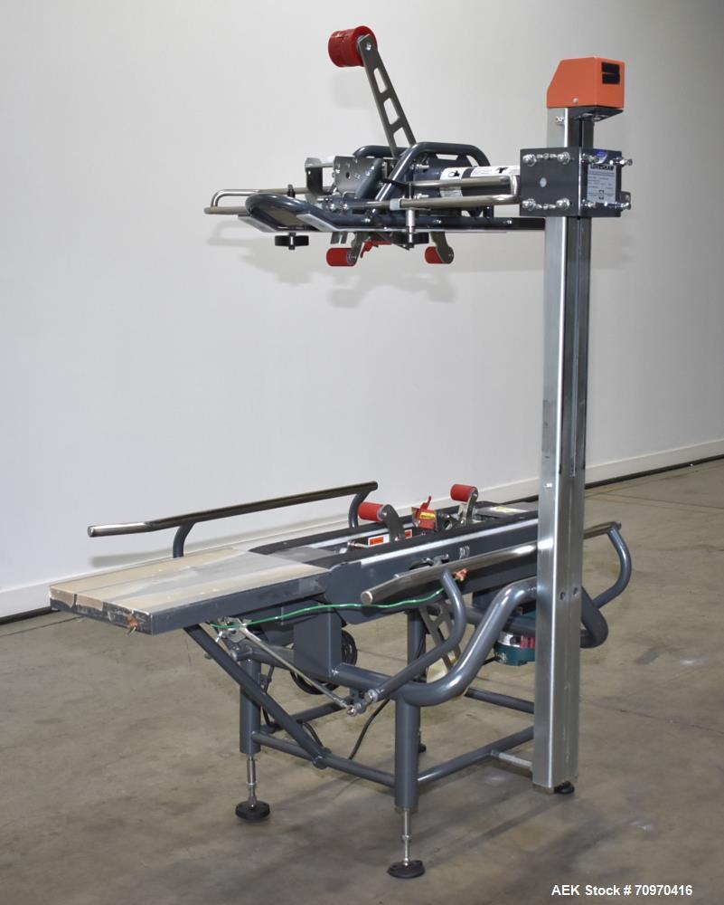 Used Loveshaw / Little David Model LDX/CRS Case Taper. Box Capacity: 4.5" to unlimited length x 5.5" to 27" width x 4.5" to 24" height. Operating belt speeds: 80 ft/min. Maximum roll diameter 15". Se...