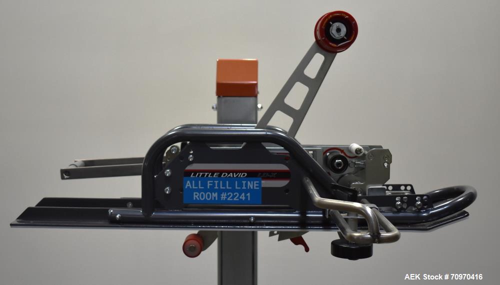 Used Loveshaw / Little David Model LDX/CRS Case Taper. Box Capacity: 4.5" to unlimited length x 5.5" to 27" width x 4.5" to 24" height. Operating belt speeds: 80 ft/min. Maximum roll diameter 15". Se...
