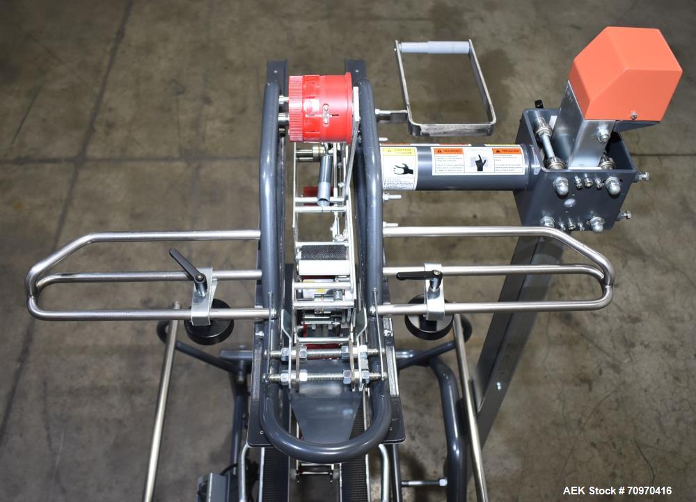 Used Loveshaw / Little David Model LDX/CRS Case Taper. Box Capacity: 4.5" to unlimited length x 5.5" to 27" width x 4.5" to 24" height. Operating belt speeds: 80 ft/min. Maximum roll diameter 15". Se...