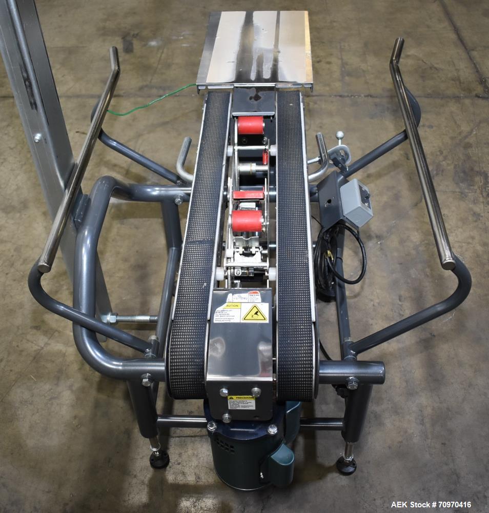 Used Loveshaw / Little David Model LDX/CRS Case Taper. Box Capacity: 4.5" to unlimited length x 5.5" to 27" width x 4.5" to 24" height. Operating belt speeds: 80 ft/min. Maximum roll diameter 15". Se...