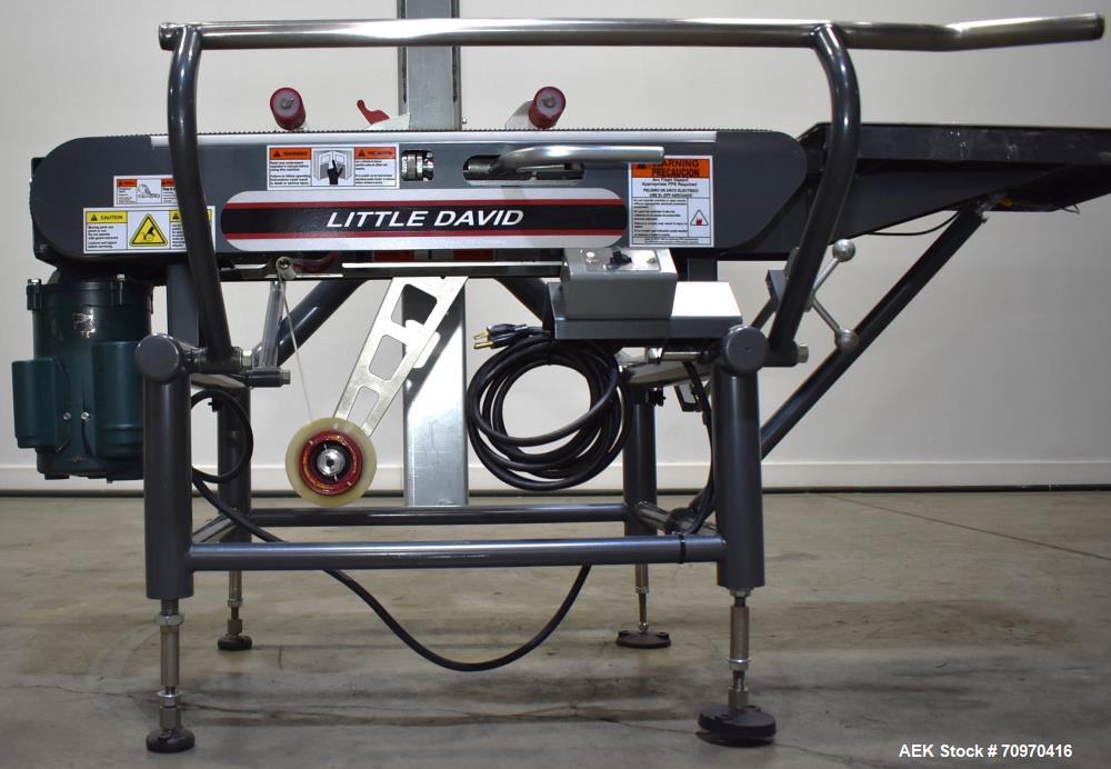 Used Loveshaw / Little David Model LDX/CRS Case Taper. Box Capacity: 4.5" to unlimited length x 5.5" to 27" width x 4.5" to 24" height. Operating belt speeds: 80 ft/min. Maximum roll diameter 15". Se...