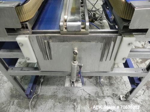 Used Durable Packaging Model RM-32FCAS Case Sealer. Machine is capable of speeds up to 40 cases per minute.Case size range: unlimited (length), 5" - 20" (width), 5" - 24" (height).Top and bottom 2" (...
