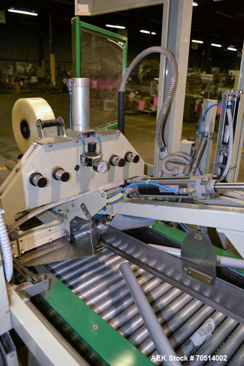 Used Sekisui TA Industries Model STA-XF50 Random Automatic Flap Closing and Taping Machine.  Up to 8 cases per minute.  Case size range:  length 7.87” to 31.5”, width 4.33” to 19.96”, height 3.94” to...