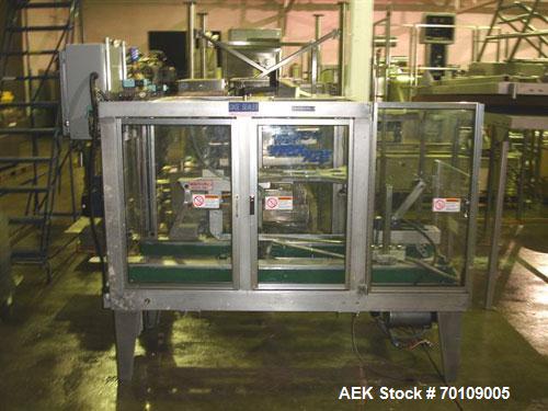 Used Wexxar WST-77 Automatic Top and Bottom Case Sealer. Capable of speeds up to 35 cases per minute. Case size range: length 12" to 33", width 10" to 22.5", depth 10" to 24". 3/60/230V.