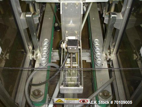 Used Wexxar WST-77 Automatic Top and Bottom Case Sealer. Capable of speeds up to 35 cases per minute. Case size range: length 12" to 33", width 10" to 22.5", depth 10" to 24". 3/60/230V.