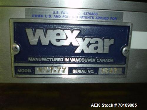Used Wexxar WST-77 Automatic Top and Bottom Case Sealer. Capable of speeds up to 35 cases per minute. Case size range: length 12" to 33", width 10" to 22.5", depth 10" to 24". 3/60/230V.