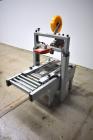 Used 3M Adjustable Case Sealer with Top Tape Applicator, Model 200a.