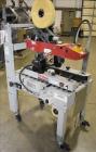 Used 3M Model 120A Adjustable Top and Bottom Case Sealer. Machine can seal a maximum of 30 boxes a minute depending on box size. Can seal maximum box dimensions of: 6