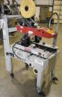 Used-3M Model 120A Adjustable Top and Bottom Case Sealer. Machine can seal a maximum of 30 boxes a minute depending on box s...