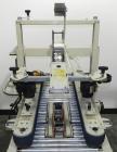 Used 3M Model 12A Semi Automatic Top & Bottom Case Sealer. Capable of speeds up to 23 cases per minute. Has a case size range: (Length) 5.87