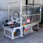Used 3M Top and Bottom Case Taper, Model 12RF, Type 18700, Carbon Steel. Up to 8 cases per minute. Case size range: Length 10’’ to 24’’, Width 8’’ to 19-1/2’’, Height 6’’ to 20’’. Tape width 3