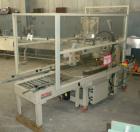 Used 3M Top and Bottom Case Taper, Model 12RF, Type 18700, Carbon Steel. Up to 8 cases per minute. Case size range: Length 10’’ to 24’’, Width 8’’ to 19-1/2’’, Height 6’’ to 20’’. Tape width 3