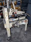 Used 3M 12A-18600 Semi auto adjustable top case taper capable of speeds up to 27 cpm depending on application, and operator dexterity. Case size range of: 6