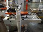 Used 3M Model 200A, Type 29200 Top and Bottom Adjustable Case Sealer. Up to 40 cases per minute, minimum case size 6
