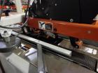 Used 3M Model 200A, Type 29200 Top and Bottom Adjustable Case Sealer. Up to 40 cases per minute, minimum case size 6