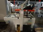 Used 3M Model 200A, Type 19000 Case Sealer. Top and bottom heads. Capable of speeds up to to 40 cases per minute, minimum case size 6