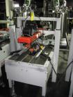 Used 3M Model 200A, Type 19000 Case Sealer. Top and bottom heads. Capable of speeds up to to 40 cases per minute, minimum case size 6