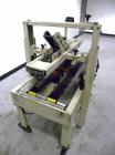 Used 3M-Matic Top And Bottom Adjustable Case Sealer, Model 22A, Type 28600, Carbon Steel. Up to 27 cases per minute. Case size range Length 6’’ to unlimited, Width 6’’ to 20’’, Height 4-3/4’’ to 20’’...
