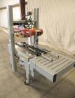 Used 3M-Matic Top And Bottom Random Case Sealer, Model 700R, Type 39600, Carbon Steel. Up to 15 cases per minute, minimum case size 6