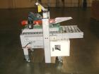 Used 3M-Matic Top And Bottom Adjustable Case Sealer, Model 800A-J, Type 19300, Carbon Steel. Up to 30 cases per minute. Case size range Length 6’’ to unlimited, Width 6’’ to 21-1/2’’, Height 4-3/4’’ ...