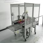 Used 3M-Matic Model 800R Random Adjustable Case Taper . Capable of speeds up to 15 cases per minute. Case size range: (width) 7