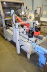 Used 3M Model 800af Adjustable Case Sealer (type 39600). Machine is capable of speeds up to 28 cases per minute. Has a case size range of: 6
