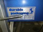 Used Durable Packaging Model RM-32A Top and Bottom Only Case Sealer. Case size range: 4-3/4