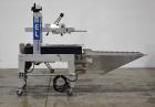 Used Belcor 150 Top and Bottom Case Tape Sealer, Model BEL 150SF. Rated up to 30 cases per minute. Case size range: 8