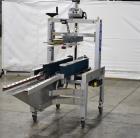 Used Belcor 150 Top and Bottom Case Tape Sealer, Model BEL 150SF. Rated up to 30 cases per minute. Case size range: 8