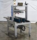 Used- Belcor 150 Top and Bottom Case Tape Sealer, Model BEL 150SF. Rated up to 30 cases per minute. Case size range: 8