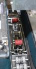 Used Belcor 150 Top and Bottom Case Tape Sealer, Model BEL 150SF. Rated up to 30 cases per minute. Case size range: 8